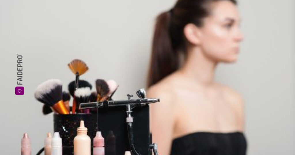 Makeup kit and pony tailed girl seating in black tank top